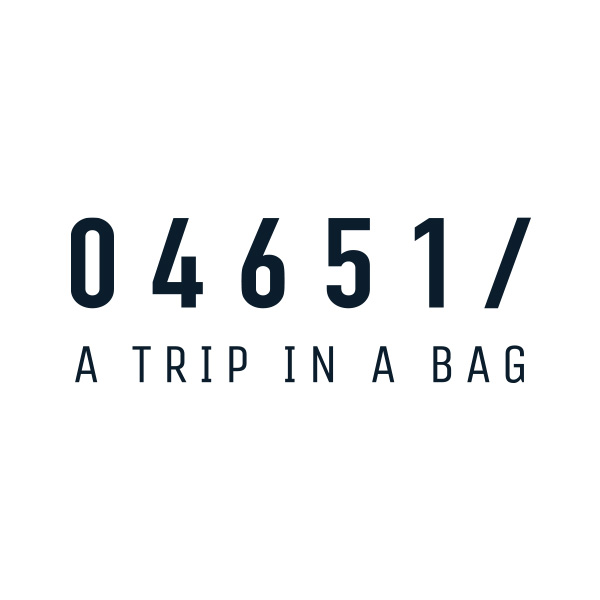 04651/ A trip in a bag logo